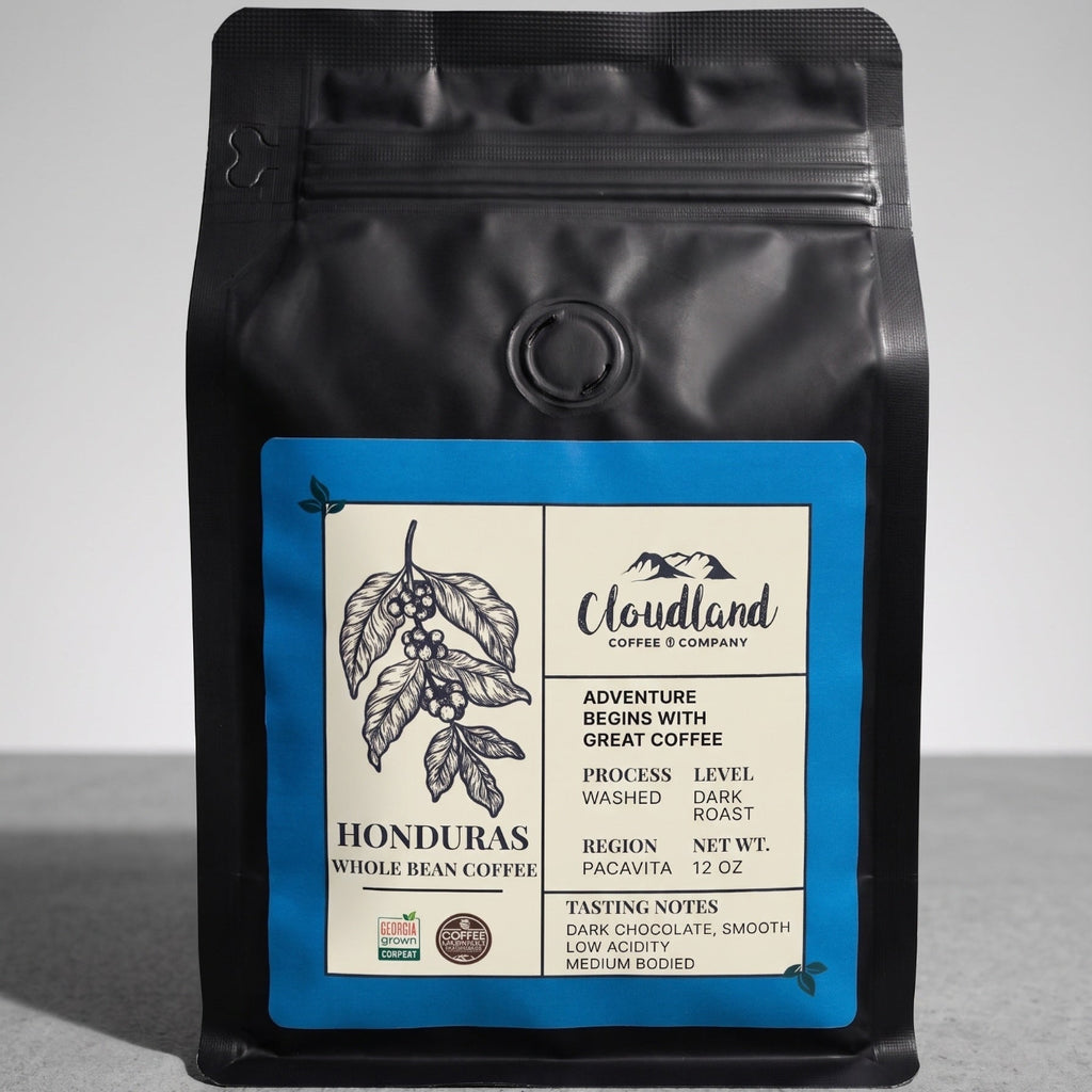 Black coffee bag with a label on a gray background