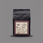 Package of espresso beans with a label on a gray background